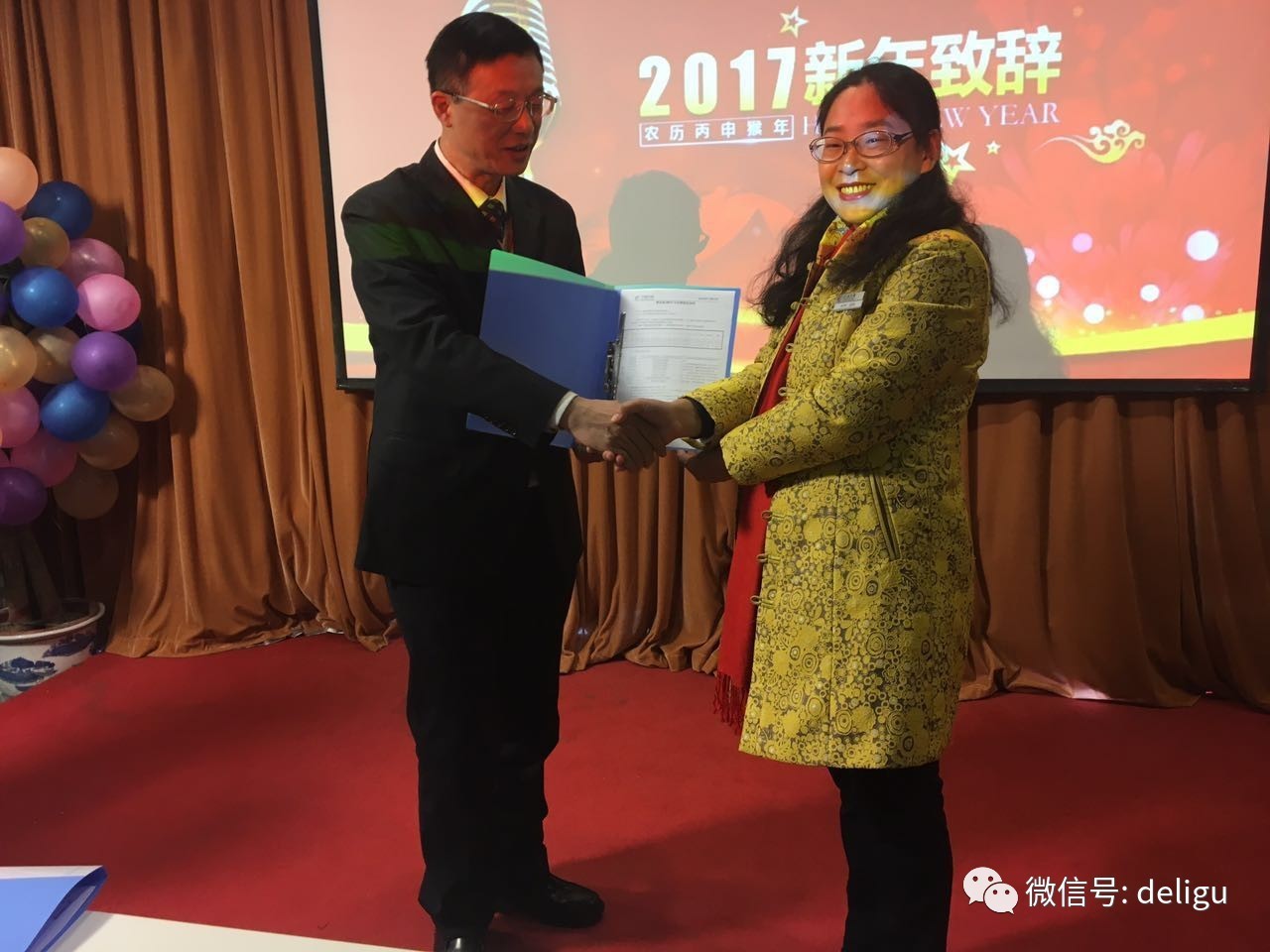 物业部陈总与周总合影