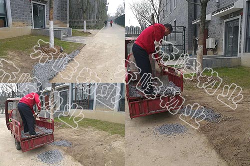 园博园齐峰物业保洁员处理路面